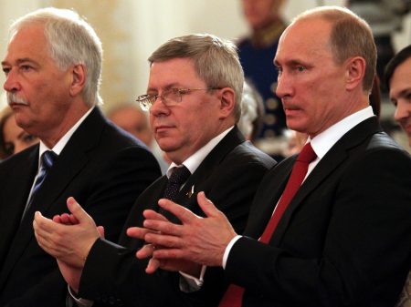 Russian politician Alexander Torshin, standing next to then-Russian prime minister Vladimir Putin, attends a ceremony at the Kremlin in 2011. Torshin is a lifetime member of the National Rifle Association, and says he met Donald Trump through the group in 2015.