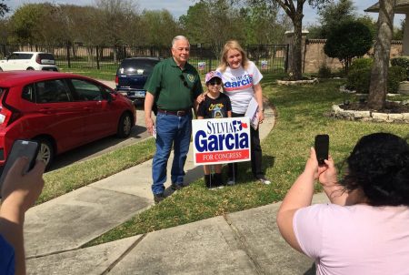 U.S. Rep. Gene Green and state Sen. Sylvia Garcia pose for a photo in Humble as they knock on doors for her congressional campaign on Saturday, March 3, 2018.