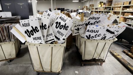 Bins of signs are seen in a storage area at the Bexar County Election offices last month in San Antonio.