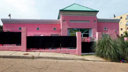 In this June 30, 2015, file photo, razor grass and pro-choice signs limit the view of patients entering the Jackson Women's Health Organization clinic in Jackson, Miss. The facility is currently Mississippi's only abortion clinic.