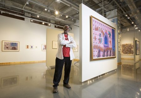 2/22/18: UHD Floyd Newsome with his art show in the O'Kane Gallery in One Main Building. Photo by Thomas B. Shea / UHD
