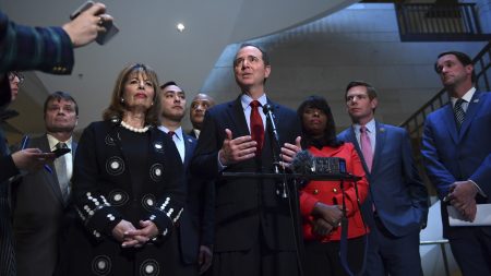 House intelligence committee ranking member Rep. Adam Schiff, D-Calif., speaks to reporters on Capitol Hill, joined by other Democrats on the committee as they released a response on Tuesday to GOP conclusions on the House Russia investigation.