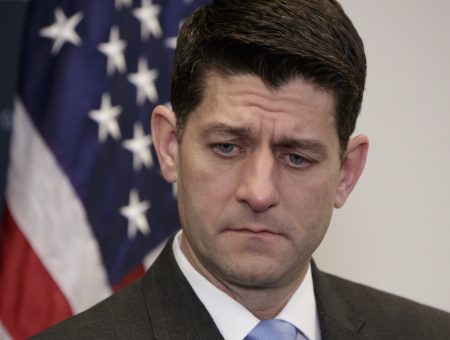 Speaker of the House Paul Ryan, R-Wis., meets with reporters following a closed-door Republican strategy session on Capitol Hill in Washington, Tuesday, March 20, 2018. Ryan says he's hoping bargainers can resolve the final disputes in a government-wide spending bill in time for Congress to begin voting Thursday on the measure.  (AP Photo/J. Scott Applewhite)