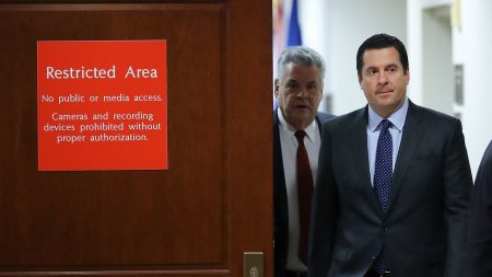House intelligence committee Chairman Devin Nunes, R-Calif., leaves the committee's secure meeting rooms at the U.S. Capitol on February 6, 2018, followed by Rep. Peter King, R-N.Y.