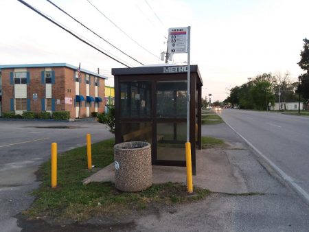 There's a covered bus stop on Lockwood at Rand Street but you can't use a sidewalk to get there.