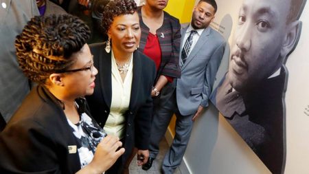 Rev. Bernice King, second from left, daughter of the late civil rights leader Rev. Martin Luther King Jr., tours an exhibit at the National Civil Rights Museum, Monday, April 2, 2018, in Memphis, Tenn. The museum was formerly the Lorraine Motel, where Rev. Martin Luther King Jr. was assassinated April 4, 1968.