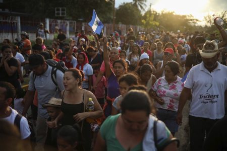 Central American migrants traveling with the annual "Stations of the Cross" caravan march to call for migrants' rights and protest the policies of U.S. President Donald Trump and Honduran President Juan Orlando Hernandez, in Matias Romero, Oaxaca State, Mexico, Tuesday, April 3, 2018. Bogged down by logistical problems, large numbers of children and fears about people getting sick, the caravan was always meant to draw attention to the plight of migrants and was never equipped to march all the way to the U.S. border. (AP Photo/Felix Marquez)