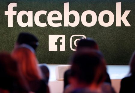 FILE PHOTO: A Facebook logo is seen at the Facebook Gather conference in Brussels, Belgium January 23, 2018.