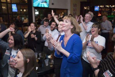 Democratic primary candidate for the 7th congressional district Laura Moser cheers with supporters at a watch party in Houston in Houston on Tuesday, March 6, 2018.