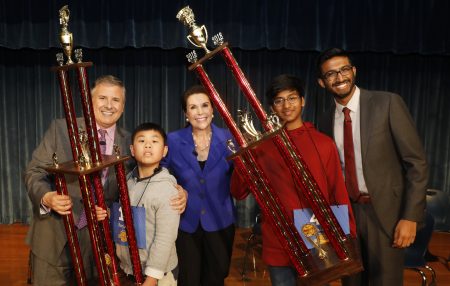 From left to right: Ernie Manouse (Host), Benjamin Chen (Runner up), Lisa Shumate (Associate Vice President and General Manager), Pranav Chemudupaty (Champion) and Anjay Ajoda (Three time Houston Spelling Bee Champion)