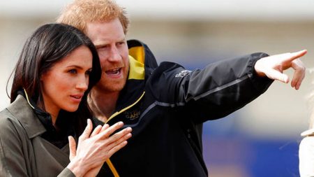 Britain's Prince Harry and his fiancee Meghan Markle attend the UK team trials for the Invictus Games Sydney 2018 at the University of Bath in Bath, England, Friday, April 6, 2018.