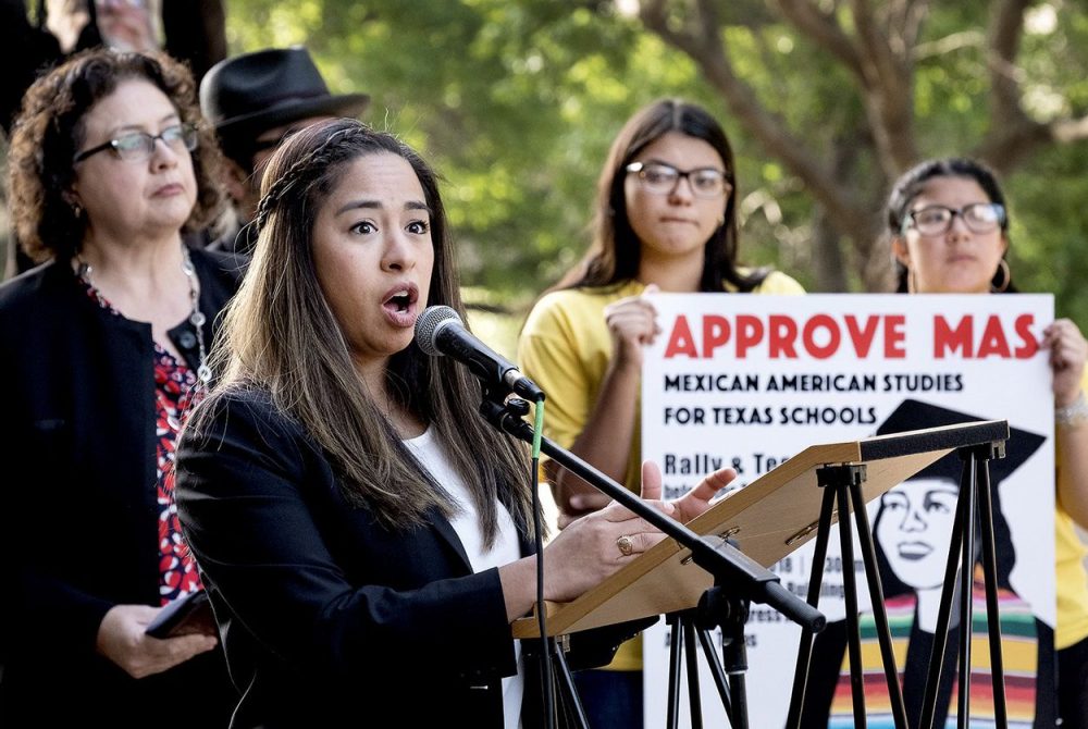 State Board of Education member Marisa Perez-Diaz speaks to a group of people rallying for the inclusion of Mexican-American studies in public school curriculum outside the Texas Education Agency on April 11, 2018.