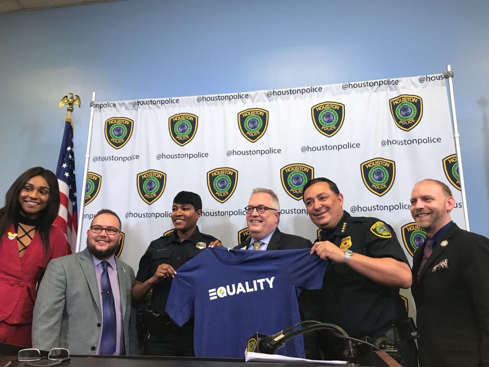 From left to right: Jessica Zyrie, clinical case manager at the Montrose Center; Lou Weaver, transgender programs coordinator at Equality Texas; HPD officer E. J. Joseph; Chuck Smith, CEO of Equality Texas; HPD chief Art Acevedo; and Kent Loftin, chief development officer at the Montrose Center pose together during the April 11, 2018, press conference where Acevedo announced a training on LGBTQ terminology for HPD officers.