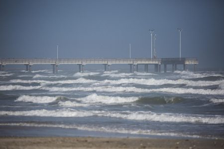 A view of a fishing pier in Port Aransas.