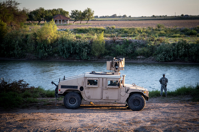 A soldier from the 36th Infantry Division, Texas Army National Guard, observes a section of the Rio Grande in support of Operation Strong Safety.


