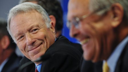 Lewis "Scooter" Libby, former chief of staff to Vice President Dick Cheney, shares a laugh with former Defense Secretary Donald Rumsfeld during a discussion at the conservative Hudson Institute.