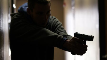 A student participates in a civilian active shooter response course for concealed weapons permit holders on March 24 in Longmont, Colo.