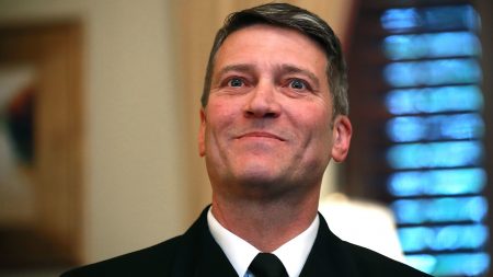 White House doctor and Navy Rear Adm. Ronny Jackson meets with Senate Veterans Affairs Committee Chairman Johnny Isakson, R-Ga., in his office on Capitol Hill April 16, 2018.