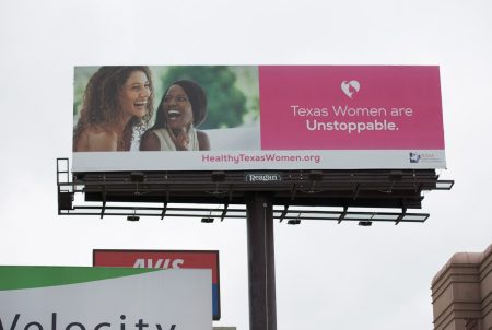 A billboard advertising the Healthy Texas Women program in downtown Austin.
