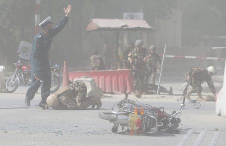 Afghan security forces are seen at the site of a second blast in Kabul, Afghanistan April 30, 2018. REUTERS/Omar Sobhani - RC19C7812B10