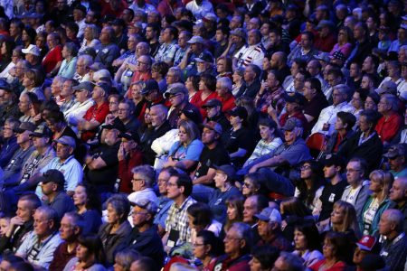National Rifle Association members listen to a speech at the NRA convention Friday, May 20, 2016, in Louisville, Ky.