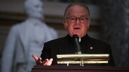 House Chaplain Patrick Conroy speaks during a memorial service at the Capitol on Sept. 27, 2017. Conroy resigned under pressure from House Speaker Paul Ryan in April, but that has been reversed after Conroy wrote to Ryan protesting his ouster and suggesting anti-Catholic bigotry was a factor.