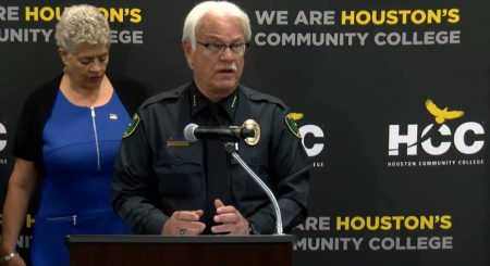 Houston Community College’s Police Chief Greg Cunningham (center) speaks about the investigation of a shooting threat during a media briefing held in Houston on May 8, 2018.
