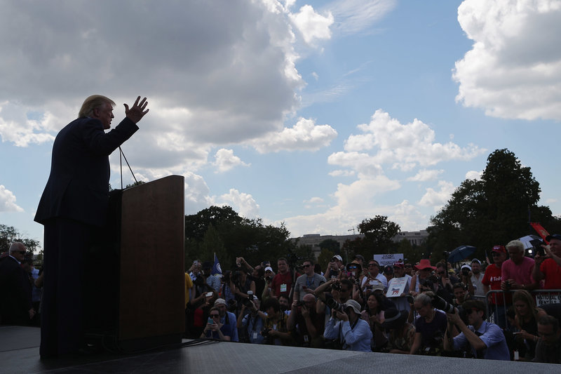 Then-presidential candidate Donald Trump addresses a rally against the Iran nuclear deal on the West Lawn of the U.S. Capitol on September 9, 2015, in Washington, D.C.
