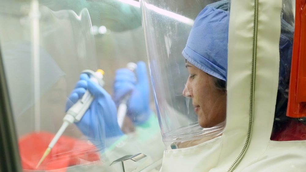 Dr. Michelle Meyer, a postdoctoral fellow at UTMB, demonstrates her work in a UTMB training lab. (2015)