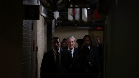 Special counsel Robert Mueller (center) leaves after a closed meeting with members of the Senate Judiciary Committee on June 21, 2017, at the Capitol in Washington, D.C.