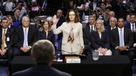 Gina Haspel is sworn in to testify at her confirmation hearing before the Senate intelligence committee in Washington on May 9. The full Senate on Thursday confirmed Haspel as CIA director, making her the first woman to hold the job.