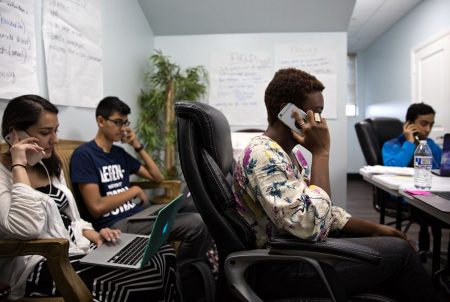 Campaign volunteers work the phones at the Sri Preston Kulkarni campaign office in Sugar Land on May 8, 2018. Kulkarni faces Letitia Plummer in the Democratic runoff for U.S. Congressional District 22.