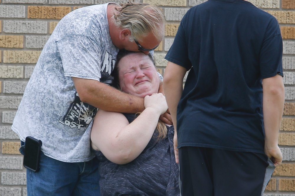 Photos: At playoff game, Houston rallies around Santa Fe High School  survivors