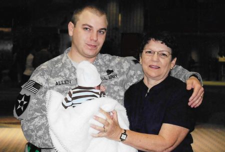 Cathy Sprigg (right) with her son, Army Spc. Robert Joseph Allen, at Tampa International Airport in 2010. Allen was headed back to Iraq after being on leave for the birth of his son