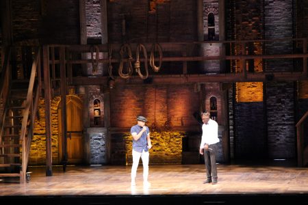 Matthew Luna (left) and Alphonzo Ward (right) perform King George v 13 Colonies Rap at the Hobby Center