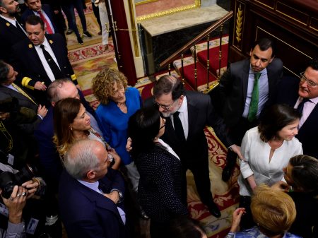 Spanish Prime Minister Mariano Rajoy, center, arrives for a vote on a no-confidence motion at the Lower House of the Spanish Parliament in Madrid on Friday.