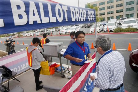 Motorists drop off their ballots at the Registrar of Voters on primary election day June 5, 2018 in San Diego. Eight states, including California, hold primary elections on Tuesday and there are several highly competitive races, including those for governor and U.S. House and Senate seats.