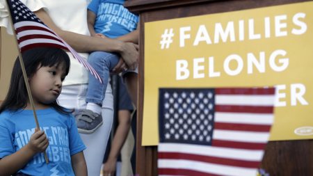 Andrea Elena Castro, daughter of Rep. Joaquin Castro (D-Texas), holds a U.S. flag during a Rally For Our Children event on May 31 to protest the "zero-tolerance" immigration policy that has led to the separation of families.