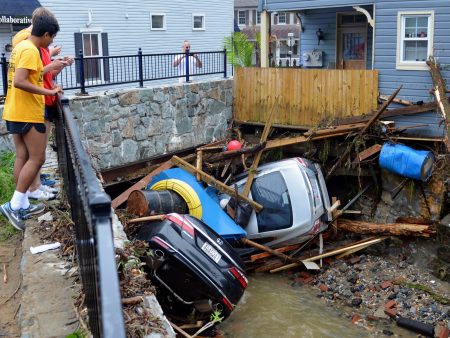 Debris and cars clog the Patapsco River in Ellicott City, Md., after flooding on May 27 that killed one person and destroyed much of the town's Main Street