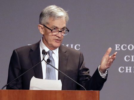 Federal Reserve Chairman Jerome Powell speaks before the Economic Club of Chicago on April 6. The central bank raised a key short-term rate by a quarter-point on Wednesday, the second increase this year