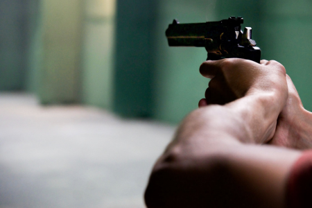 Revolver Being Fired at a Firing Range