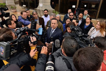 State Sen. Carlos Uresti, D-San Antonio, speaks at a press conference outside the federal courthouse in San Antonio after being found guilty of multiple felonies on Feb. 22, 2018.