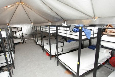 Bunk beds are lined up inside an air-conditioned tent at the Tornillo facility for unaccompanied immigrant children near El Paso.
