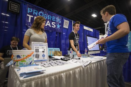 A table for the liberal communications groups Progress Texas in the exhibitor's hall at the Texas Democratic Convention in Fort Worth, Texas. "It's up to the candidates to reach out," to young voters, says executive director Ed Espinoza.