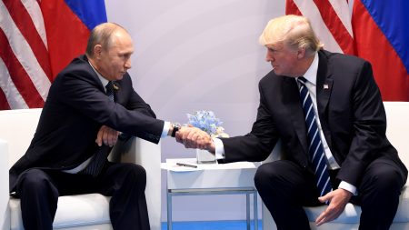 President Trump and Russian President Vladimir Putin shake hands during a meeting on the sidelines of the G20 Summit in Hamburg, Germany, on July 7, 2017. The two leaders are expected to meet again over the summer.
