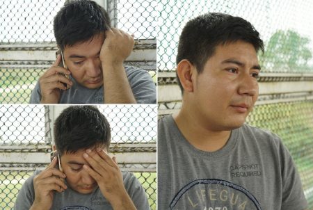 Marcos Samayoa learns that his wife is detained and has been separated from their children as he waits on the Brownsville/Gateway International Bridge on June 20, 2018.