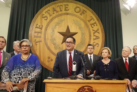 Flanked by fellow lawmakers from the House, State Rep. Larry Gonzales, R-Round Rock, speaks at a press conference on May 28, 2017.