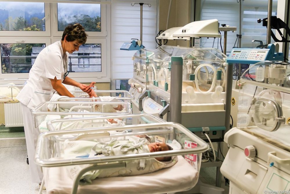 A midwife cares for a newborn baby at the Independent Public Health Care Center in Myślenice, Poland.  