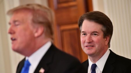 Supreme Court nominee Brett Kavanaugh listens to President Trump announcing his nomination in the East Room of the White House on Monday.