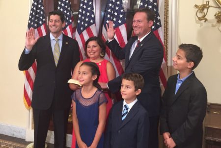 U.S. Rep.-elect Michael Cloud (right) participated in a mock swearing in with U.S. House Speaker Paul Ryan and Cloud’s family on July 10, 2018. Moments later, Cloud was officially sworn in on the House floor.